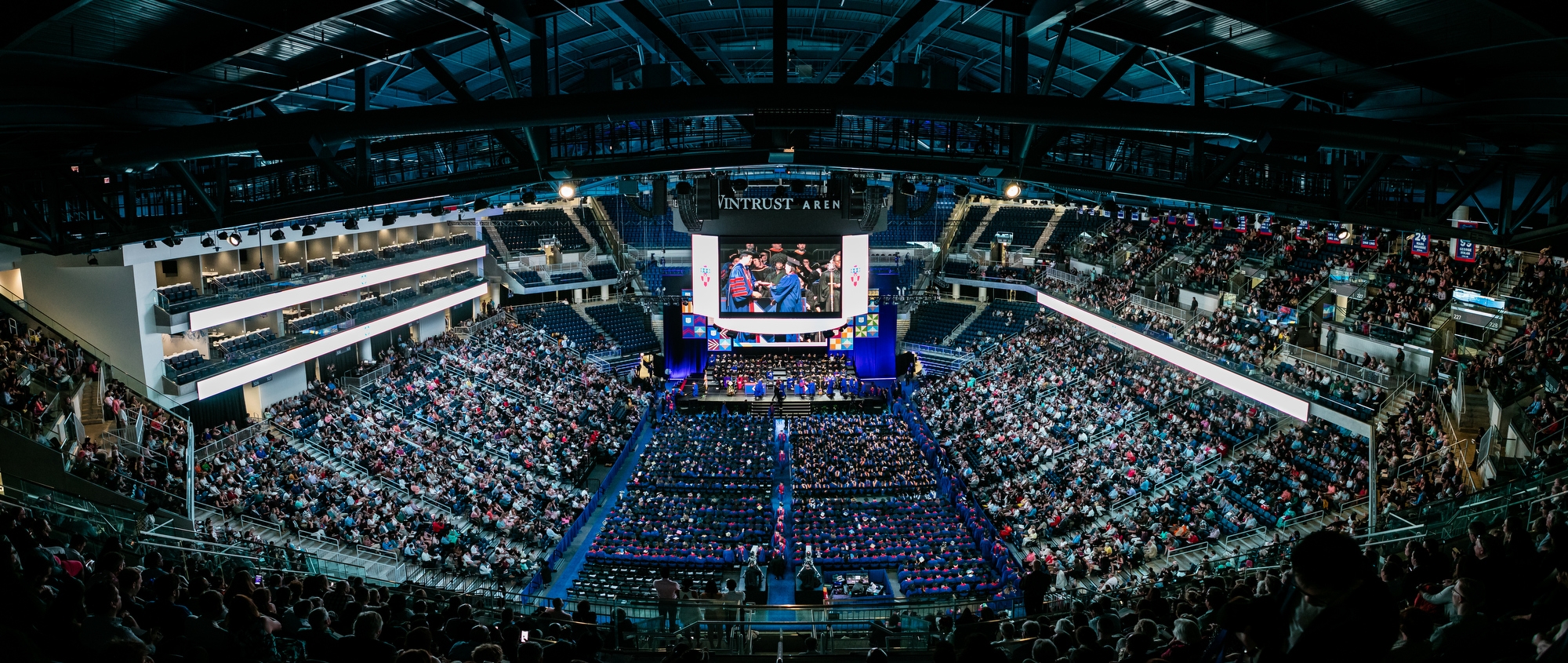 Graduates, friends and family fill Wintrust Arena during one of five ceremonies held in Chicago by DePaul University  over commencement weekend. (DePaul University/Jeff Carrion)